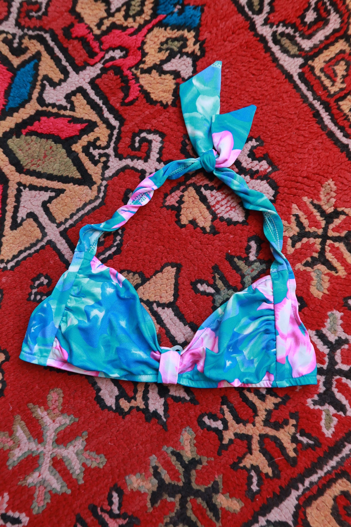 Vintage Tropical Floral Halter Bikini Top by Elektra Vintage, featuring vibrant floral print and halter strap design.