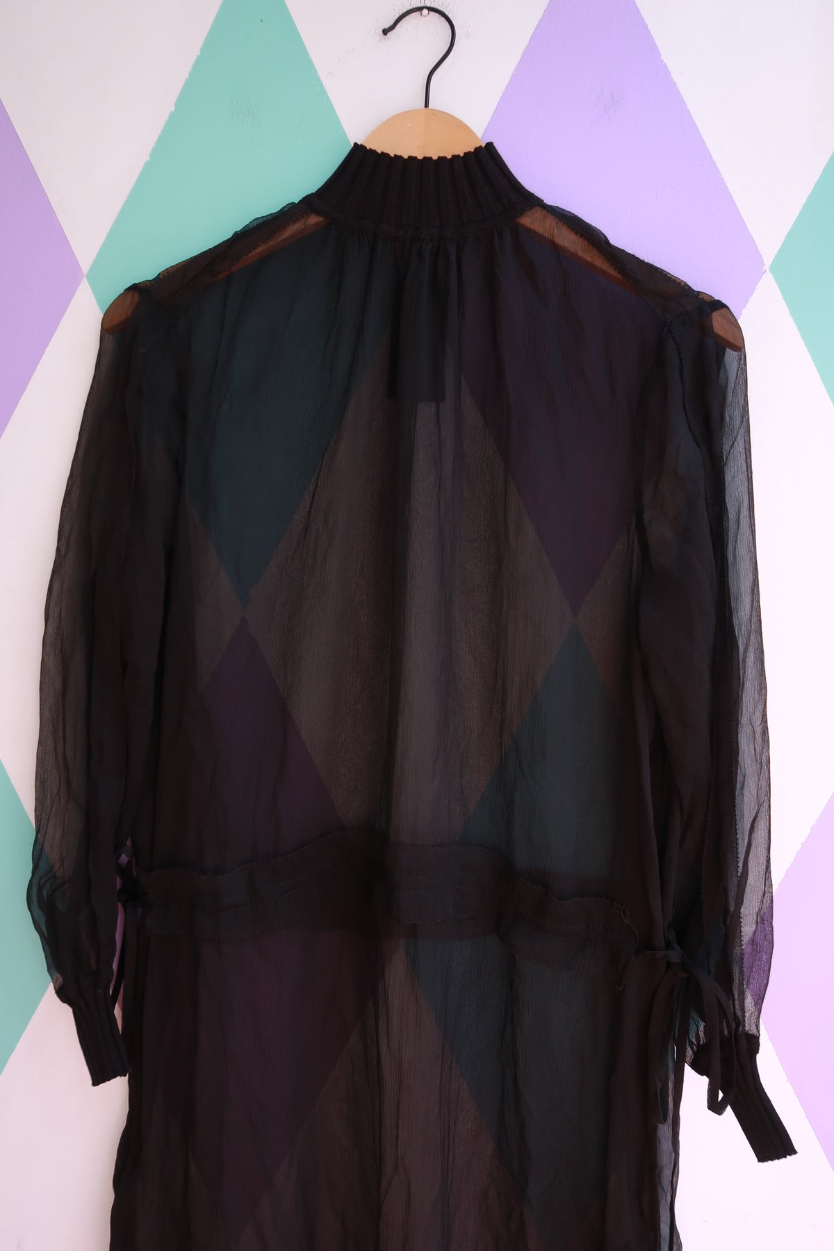 Black silk sheer midi dress by Rag & Bone, featuring elegant flowy fabric and a sophisticated silhouette.
