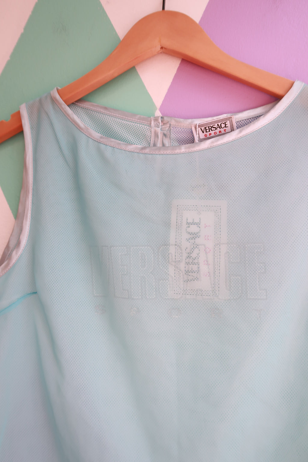 Vintage Versace ice blue sheer mesh tank top for women, featuring a stylish and lightweight design by Elektra Vintage.
