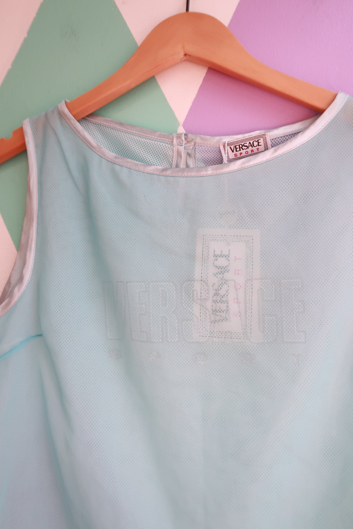 Vintage Versace ice blue sheer mesh tank top for women, featuring a stylish and lightweight design by Elektra Vintage.