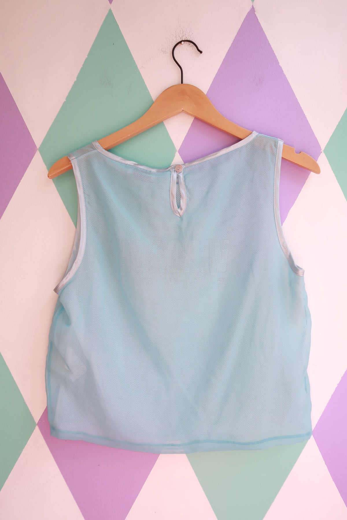Vintage Versace Ice Blue Sport Sheer Mesh Tank Top for women, featuring a lightweight, breathable design by Elektra Vintage.