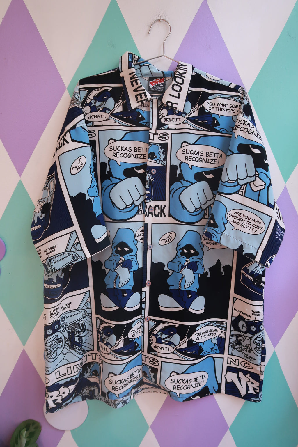 Men's vintage Y2K comic strip graphic button-up shirt by Elektra Vintage, featuring bold comic print and classic collar design.
