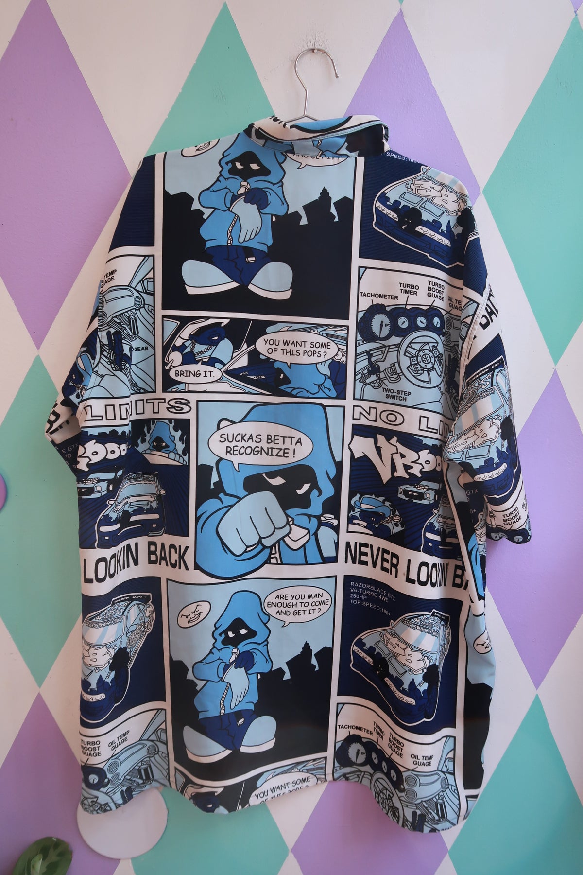 Men's vintage Y2K comic strip graphic button-up shirt by Elektra Vintage, featuring colorful retro comic designs.