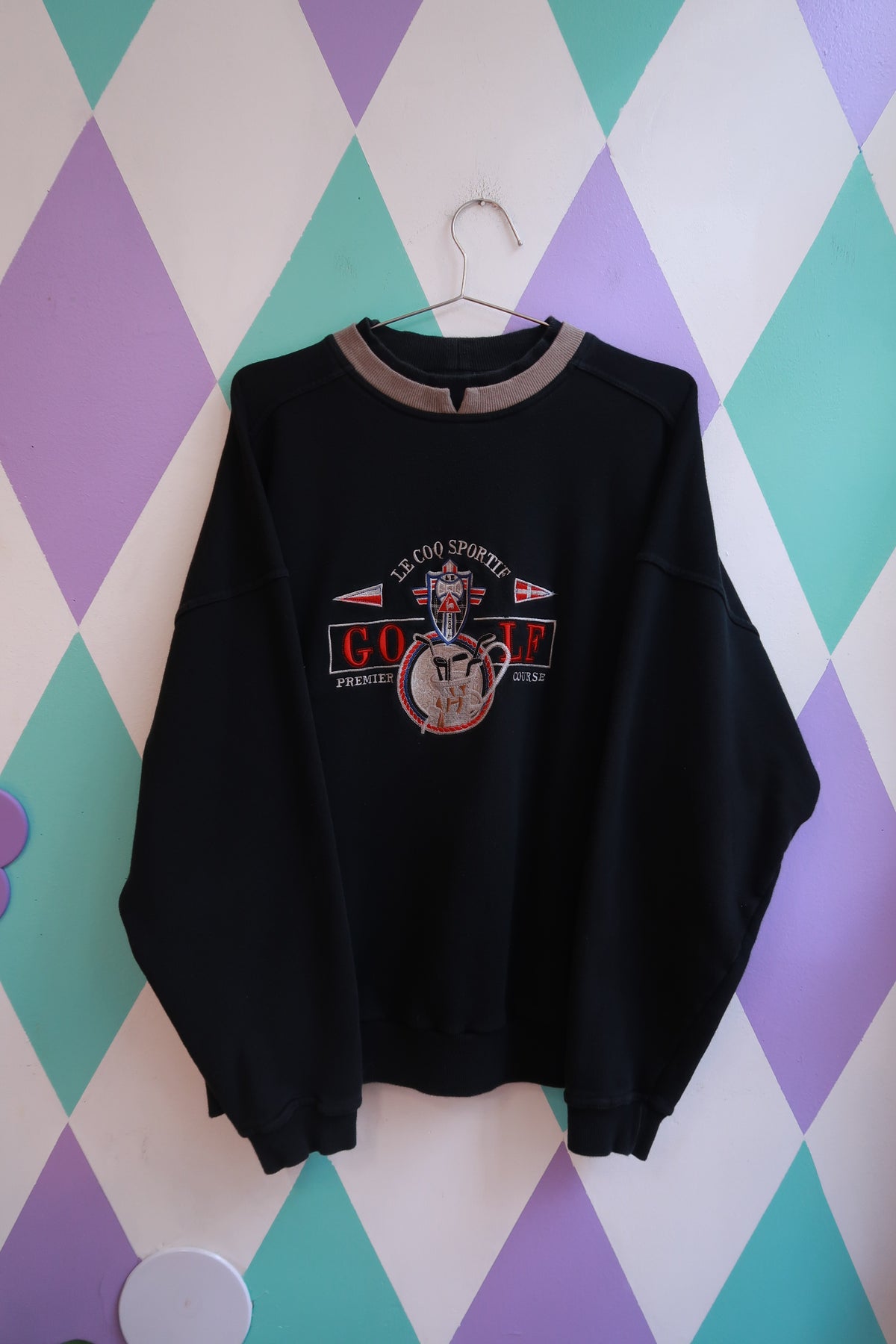 Elektra Vintage men's Le Coq Sportif golf embroidered sweatshirt with classic logo, soft fabric, and vintage sporty style.