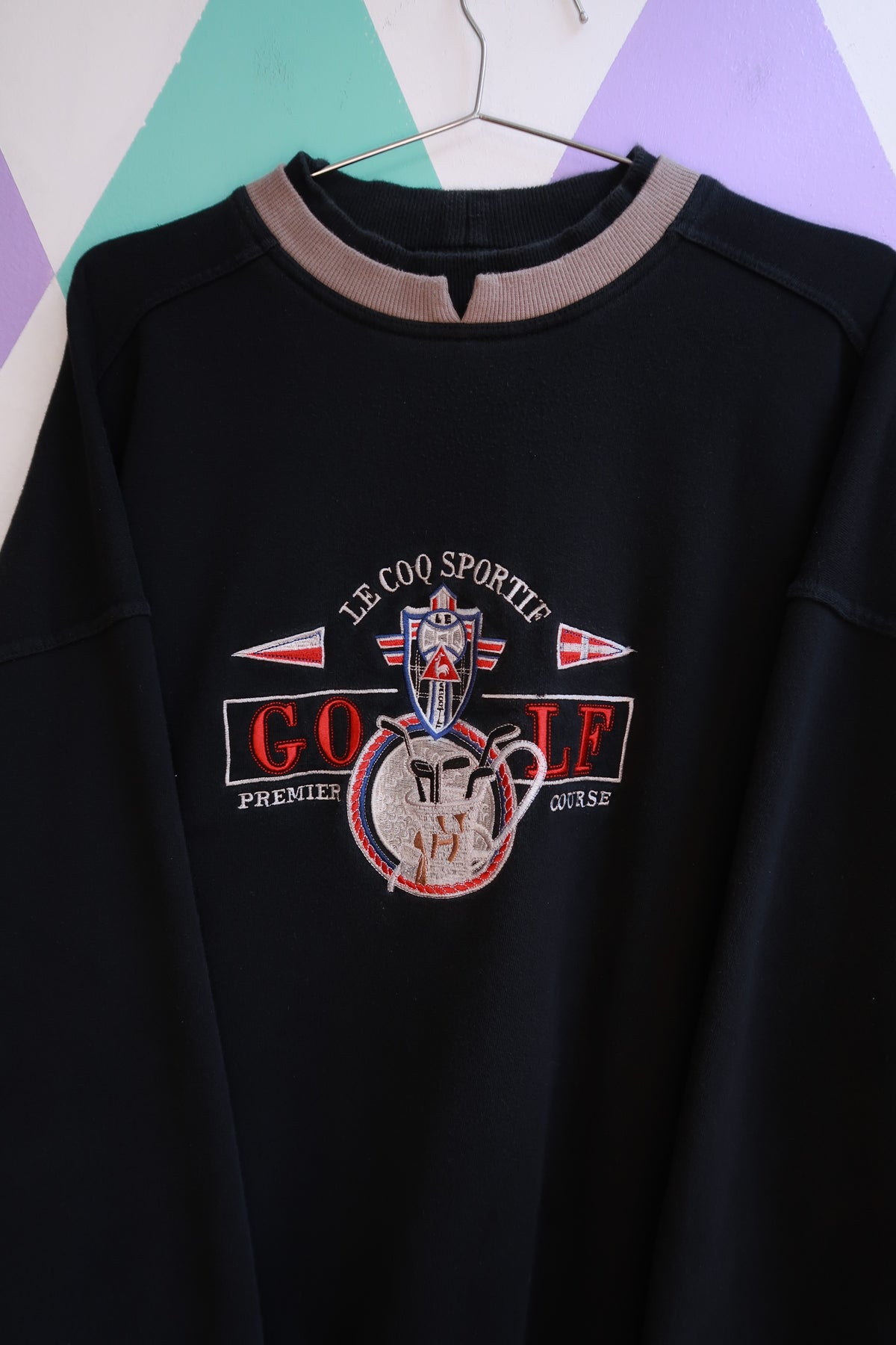 Men's vintage Le Coq Sportif golf embroidered sweatshirt by Elektra Vintage, featuring classic logo embroidery and comfortable fit.