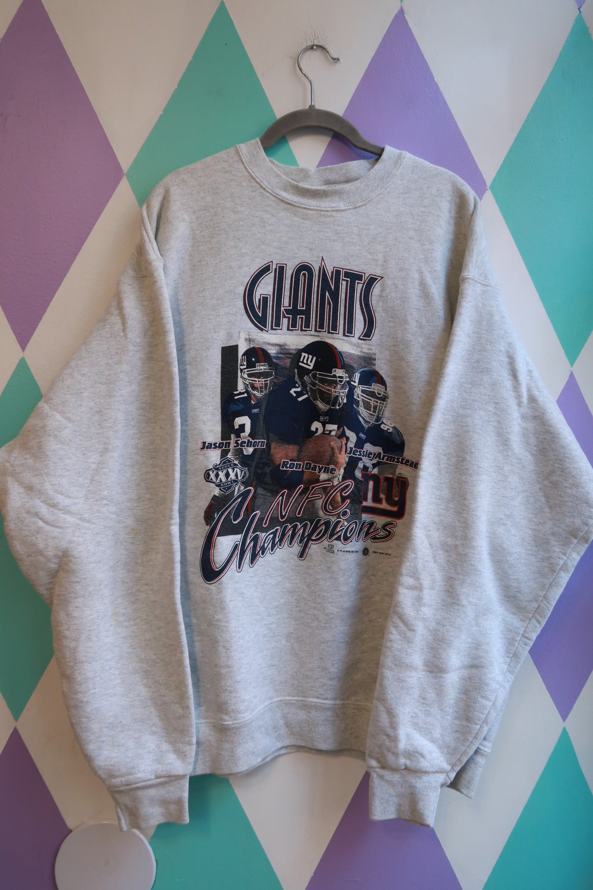 Men's Vintage New York Giants NFC Champions crewneck sweatshirt by Elektra Vintage, featuring team logo and retro design.