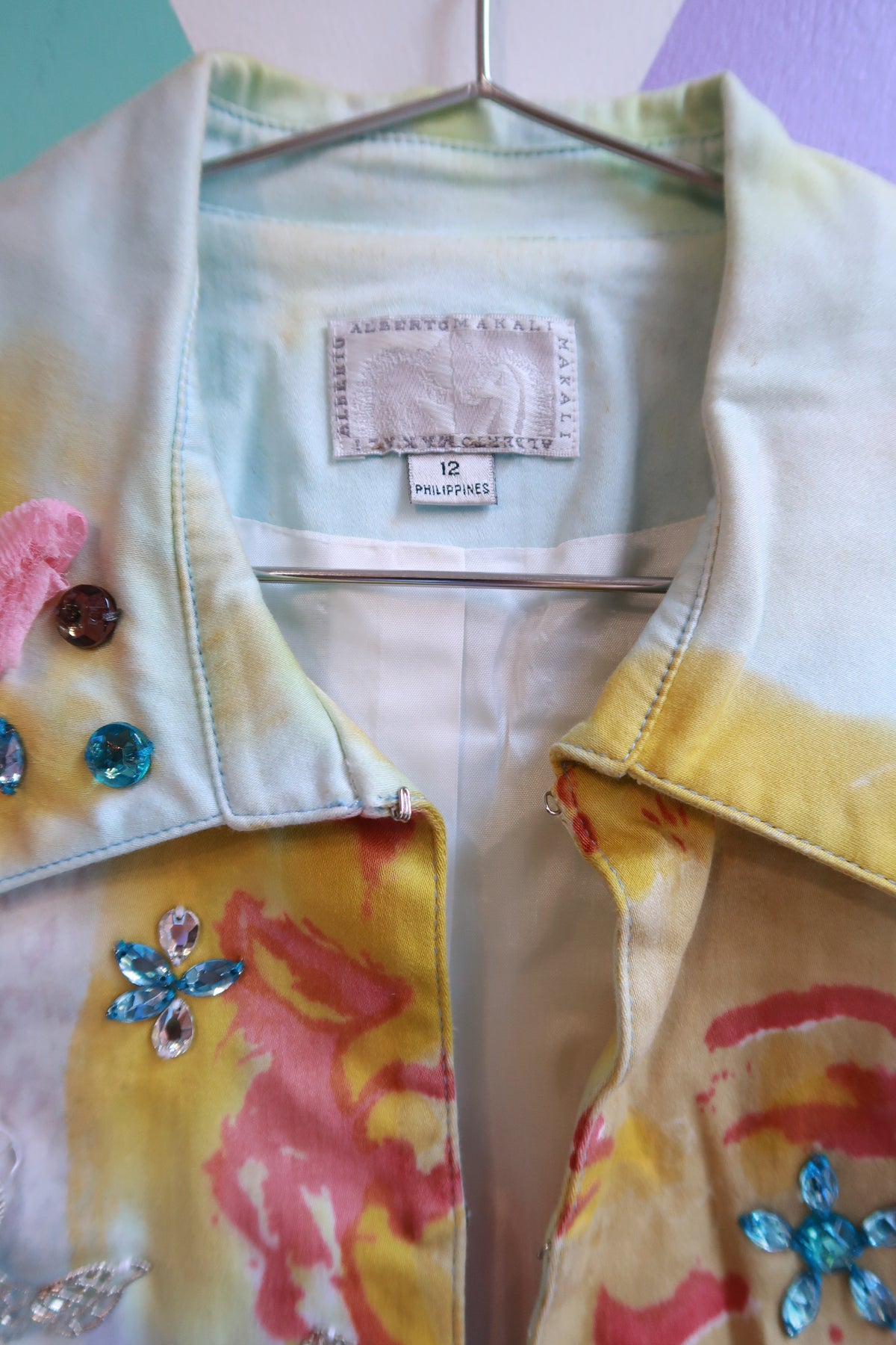 Vintage hand-painted pop art embellished jacket by Elektra Vintage, featuring colorful artistic details on fabric.