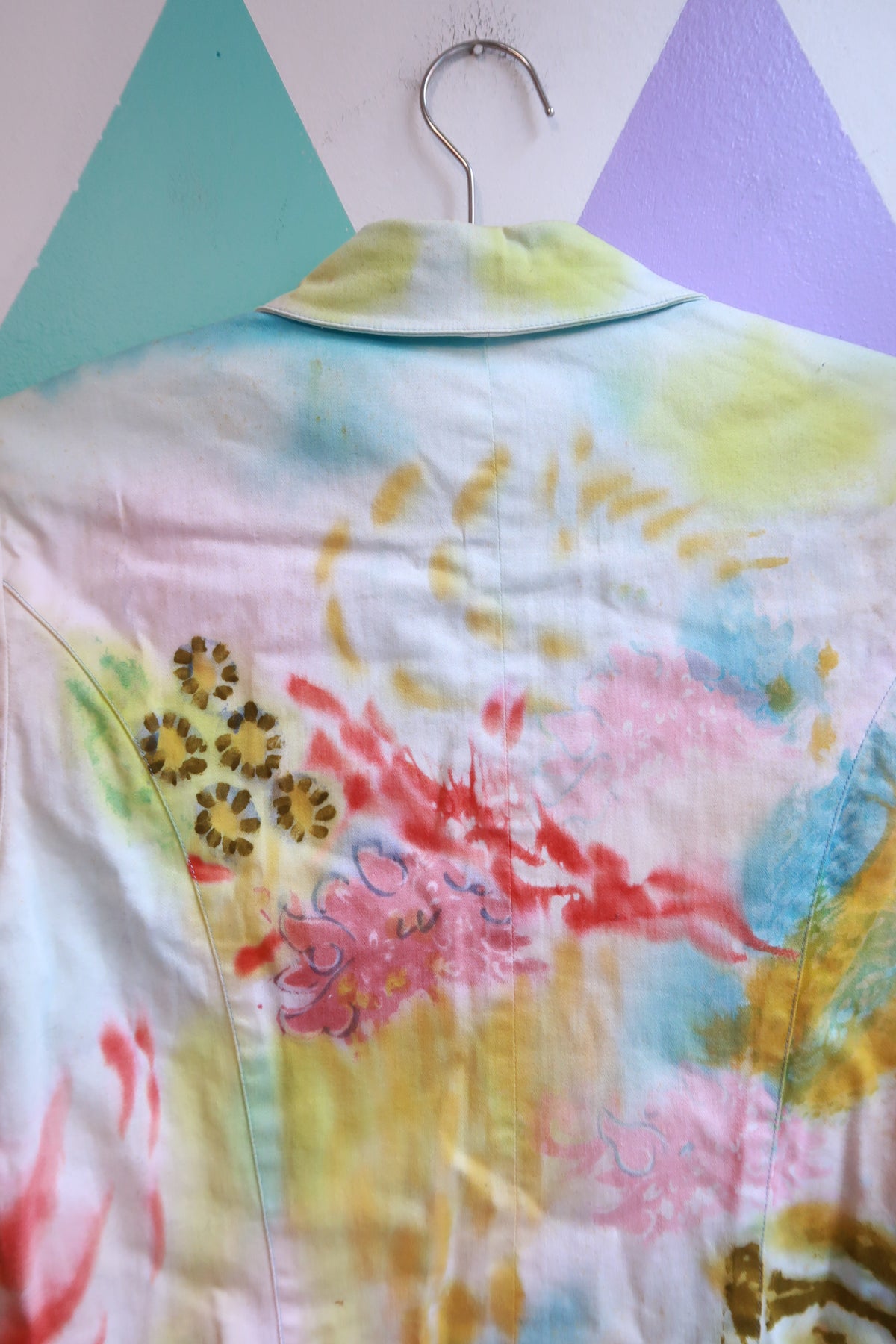 Vintage hand-painted pop art embellished Elektra Vintage jacket with colorful artistic designs and textured fabric details.