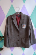 Women's Vintage American Eagle Tweed Crest Blazer jacket by Elektra Vintage, shown in a classic tailored fit with textured tweed fabric.