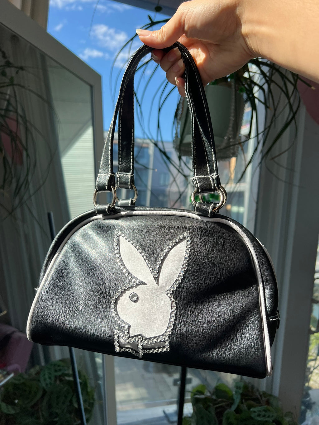 Vintage black Playboy bowler bag by Elektra Vintage featuring a classic 2000s design with sturdy handles and sleek style.