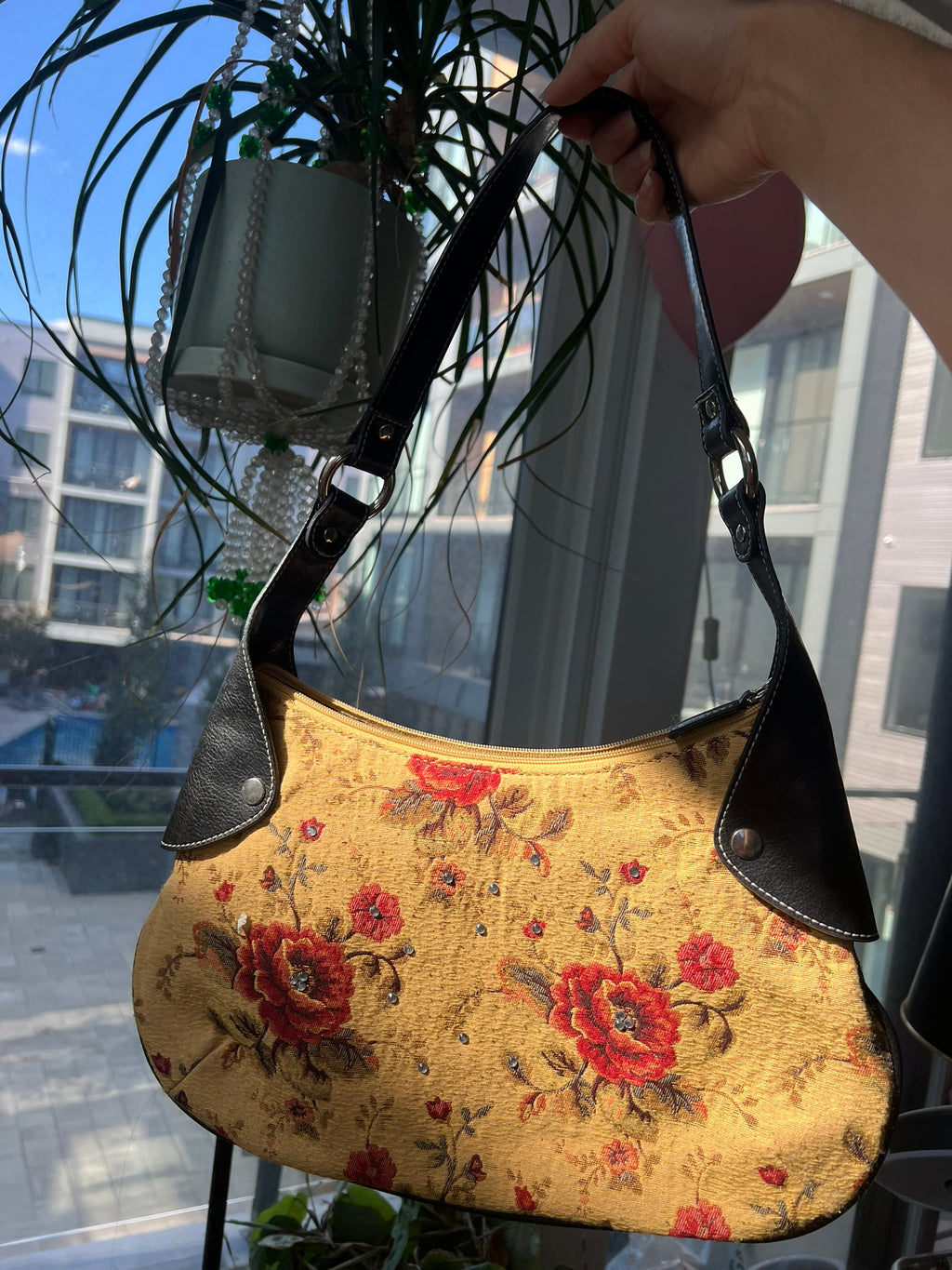 Vintage yellow flower print purse with leather accents by Elektra Vintage, showcasing floral design and stylish details.