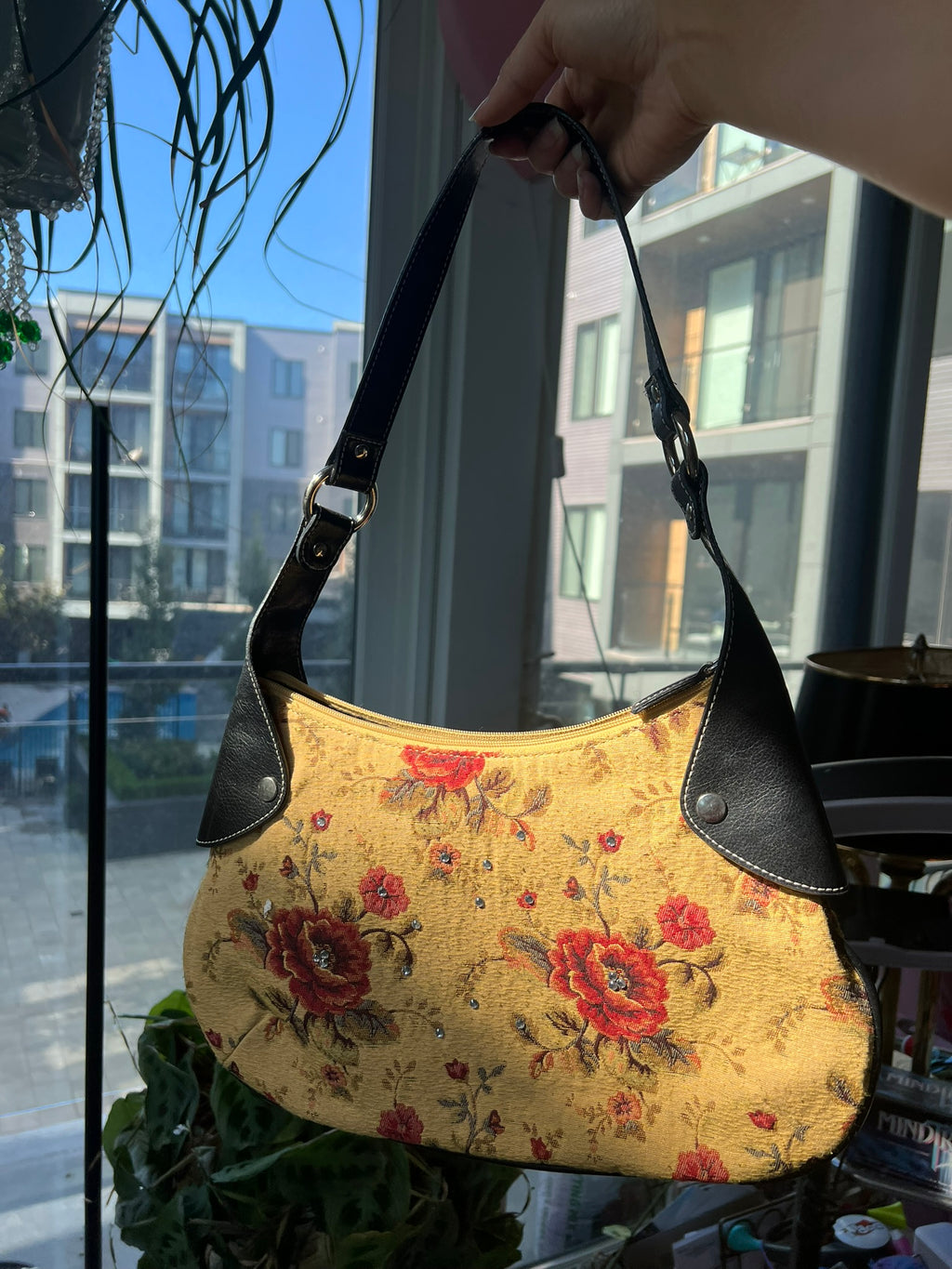 Vintage yellow flower print purse with leather accents by Elektra Vintage, showcasing its floral design and stylish features.