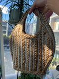 Elektra Vintage jute petite stripe tote bag with woven handles and a striped pattern, ideal for casual, eco-friendly carrying.