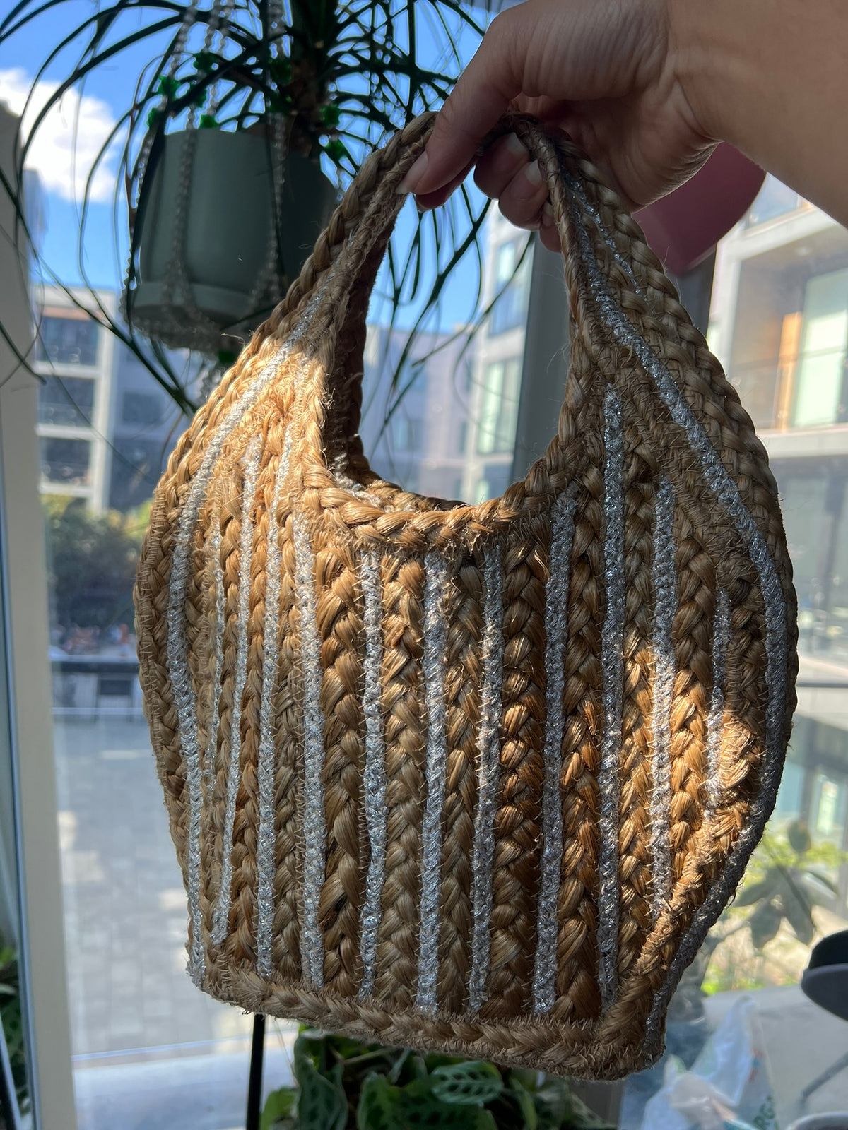 Elektra Vintage jute petite stripe tote bag with woven handles and a striped pattern, ideal for casual, eco-friendly carrying.